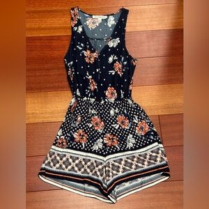 Boho blue floral sleeveless romper from Abercrombie